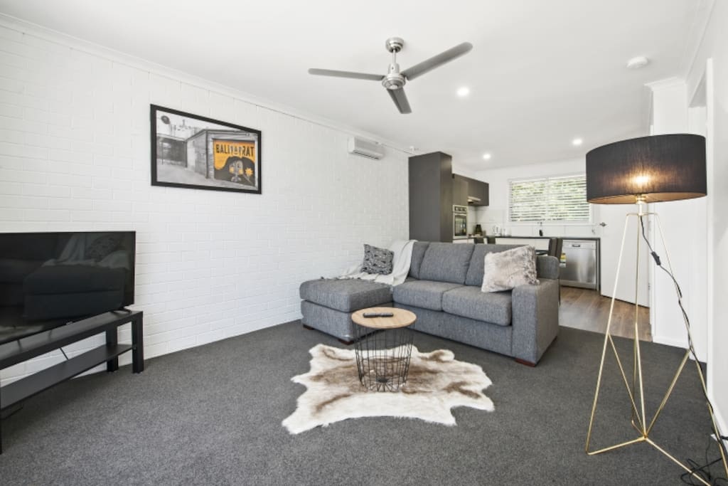 Open plan living with adjoining kitchen