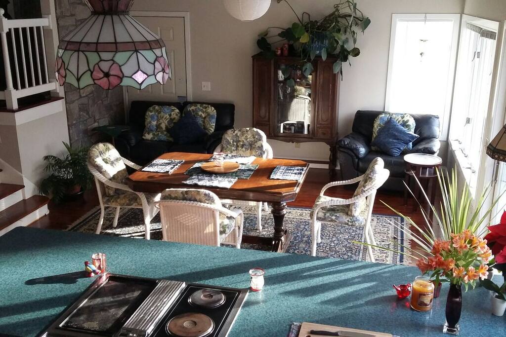 the dining area as seen from the kitchen. sliders to 30x30 deck on the right.