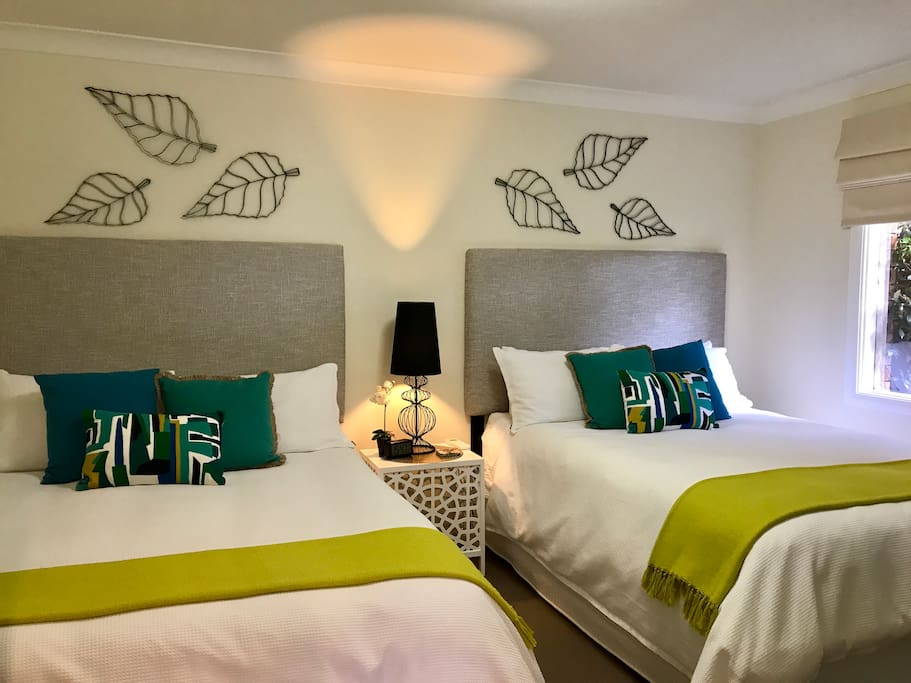 Just updated to 2 new soft queen beds and new linen! We have a very high standard of cleanliness as you can see in our reviews! This room also has a window, wardrobe and heat/air conditioning.