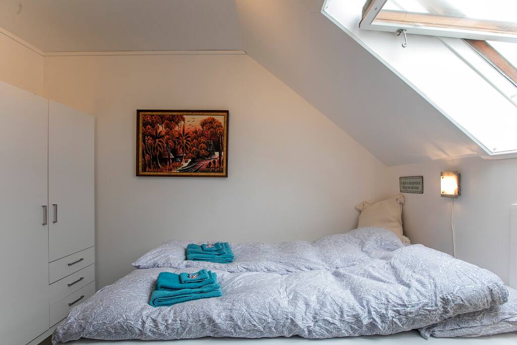 Doublebed with wardrobe.