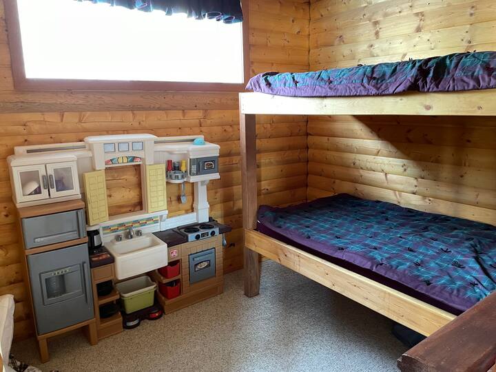 Downstairs bedroom and toy area. Bunk beds 39x75"