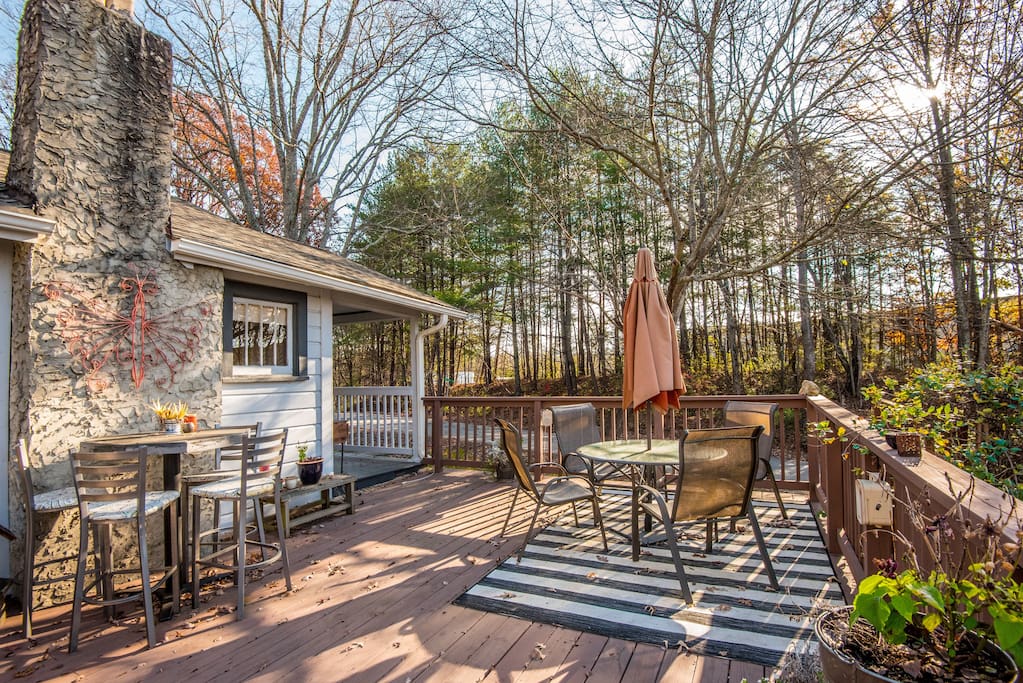 Large deck with lots of seating and mountain views
