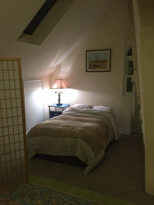 Full size bed (left side of loft bedroom)