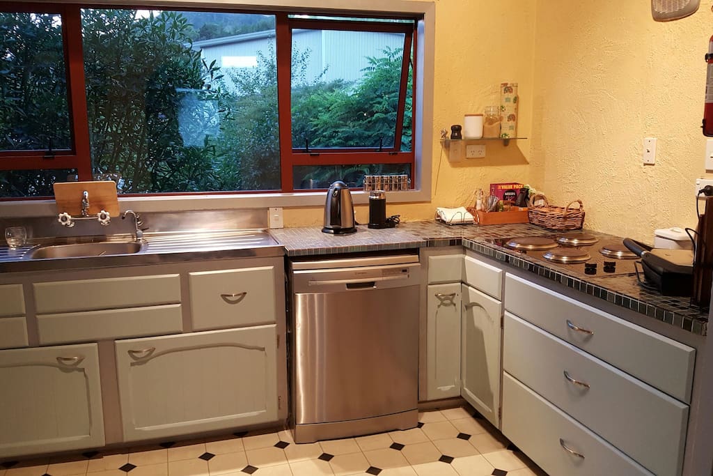 Communal kitchen with dishwasher, microwave, cooktop and oven for you to use. Space in the fridge for your food :-)