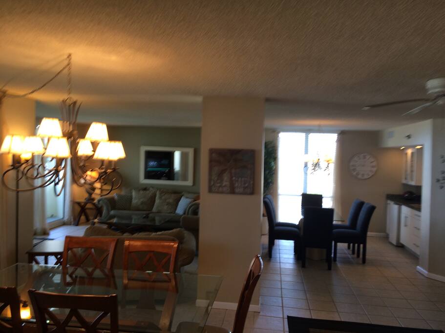 Living Area with Dining Area in Foreground and Additional Seating in Background