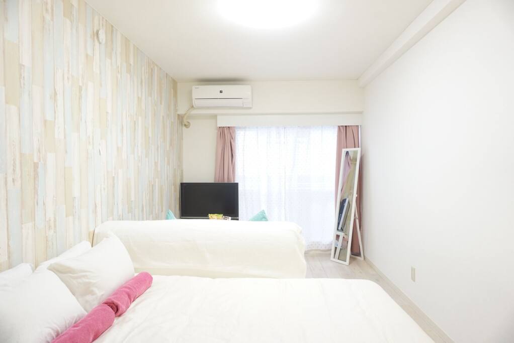 Double size bed 146 cm × 196 cm
32 inch Sony TV, mirror, table.