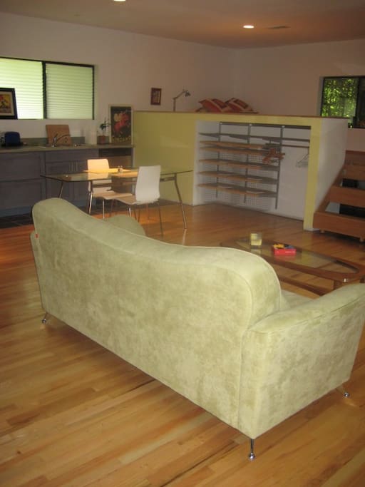 Comfortable living space, with raised sleeping area.