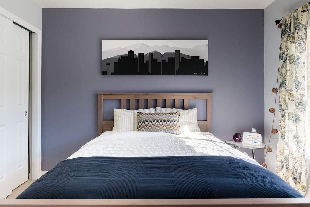 Queen-size bed with extra pillows and blankets available. It is a European style bedding layer with Duvet cover and fitted sheet.