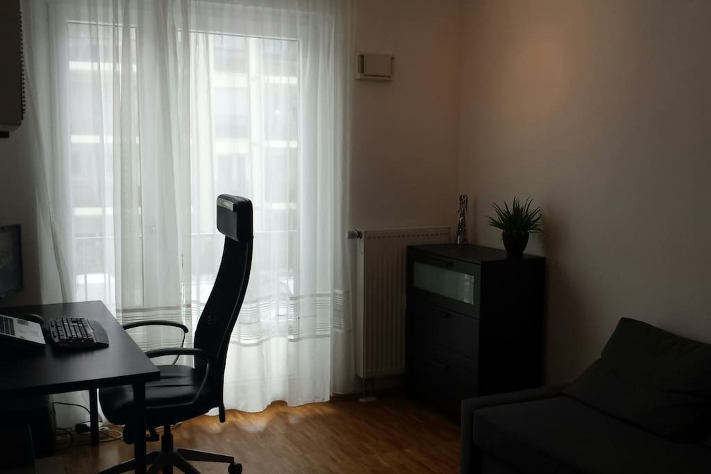 Your room with bed, table, wardrobe, tv