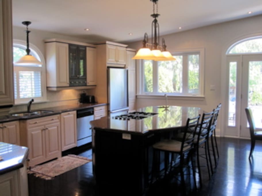 Kitchen -- Open concept. Great for entertaining.