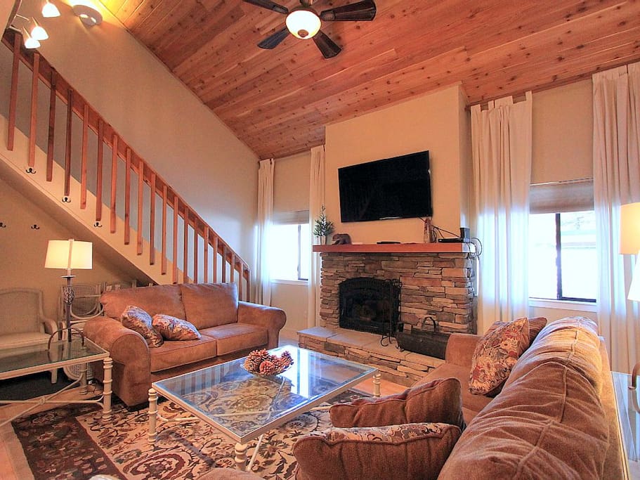 Wood fireplace and flat screen TV