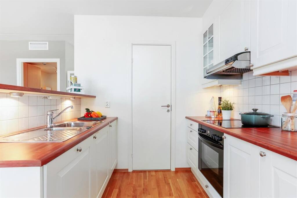 Kitchen with microwave, dishwasher, oven, freeser and fridge