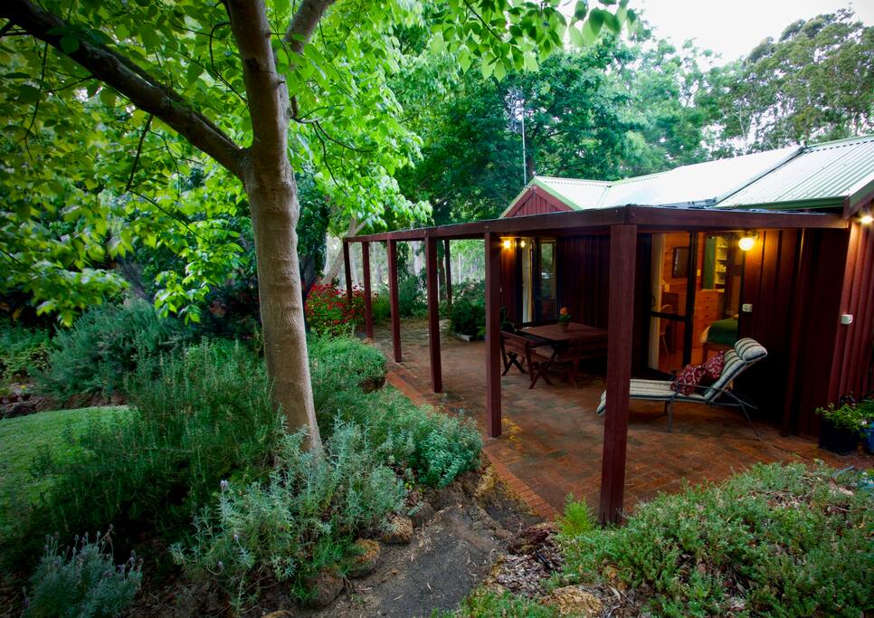 A cottage in a peaceful garden setting - a relaxing place to stay in the stunning south-west.