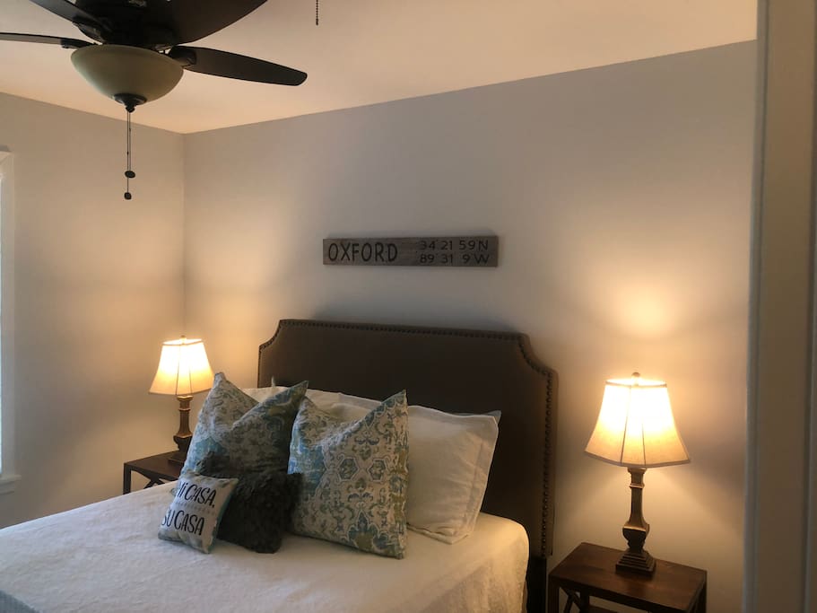 Bedroom 1 - Relax and rest in a comfortable queen bed with amenities which include flat screen TV, night stands and full closet