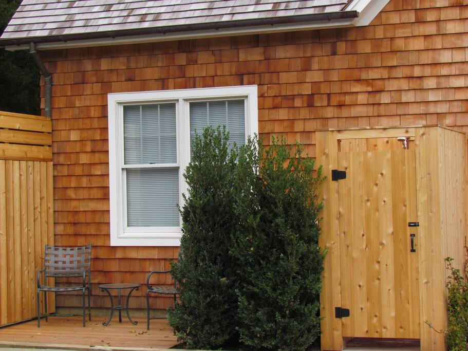 Enclosed hot/cold outdoor shower.