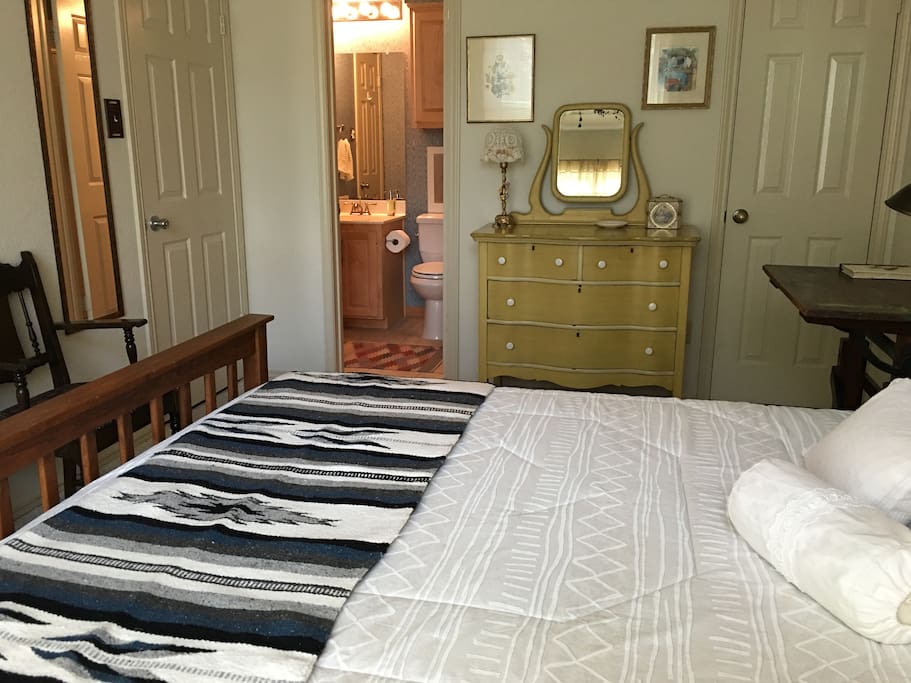 Bedroom, dresser, closet, and private bath