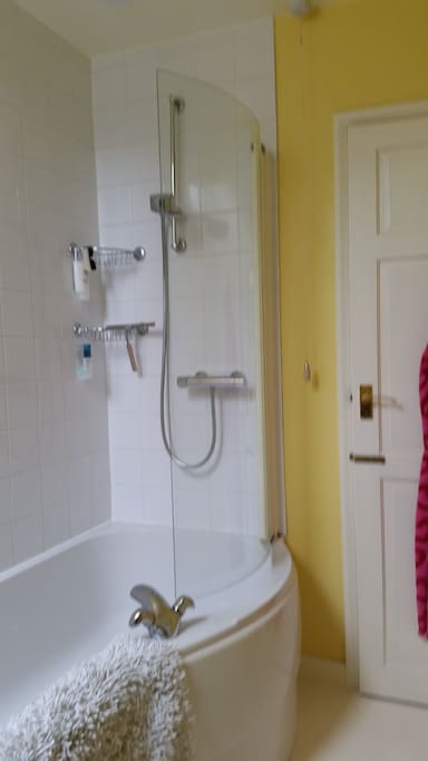 Bath with power shower cabinet