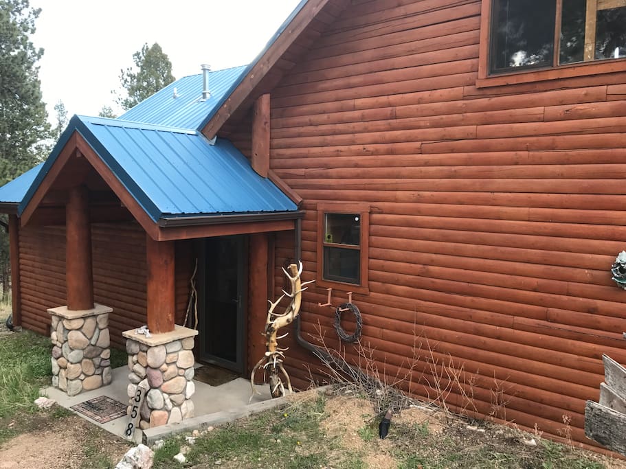 Front of the log cabin.