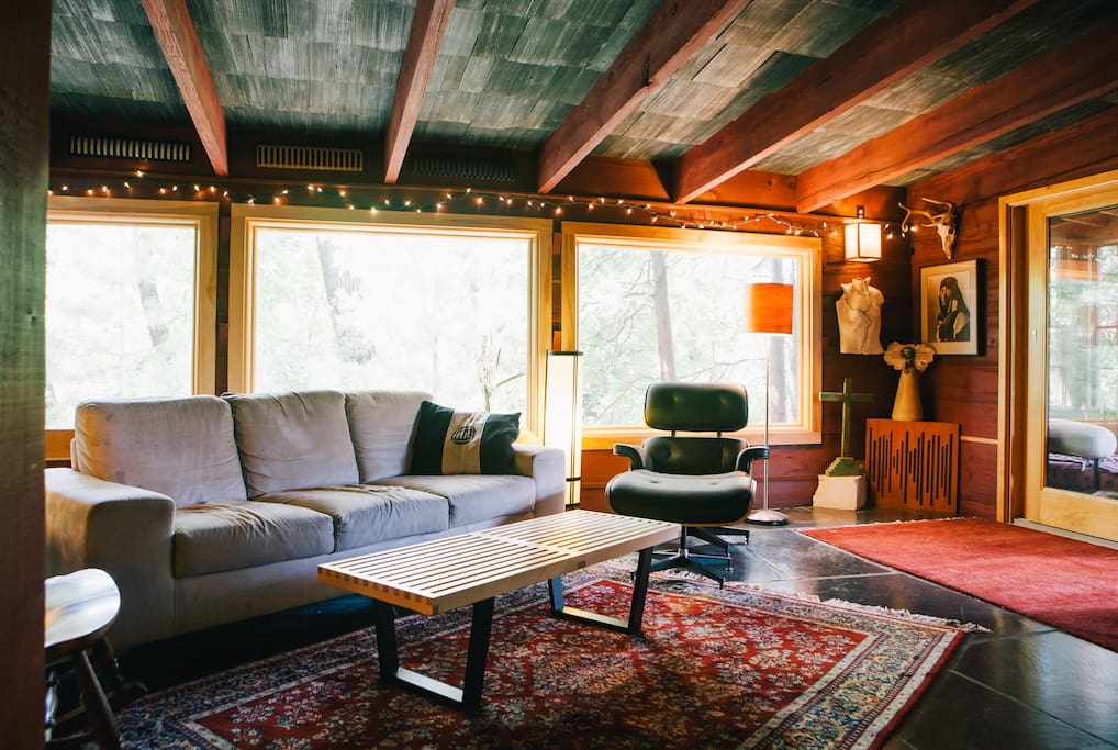 Living room with heated black slate floors.