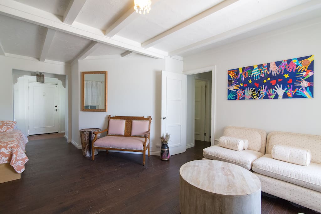Another view of the living room showing doorway to bedroom and bathroom