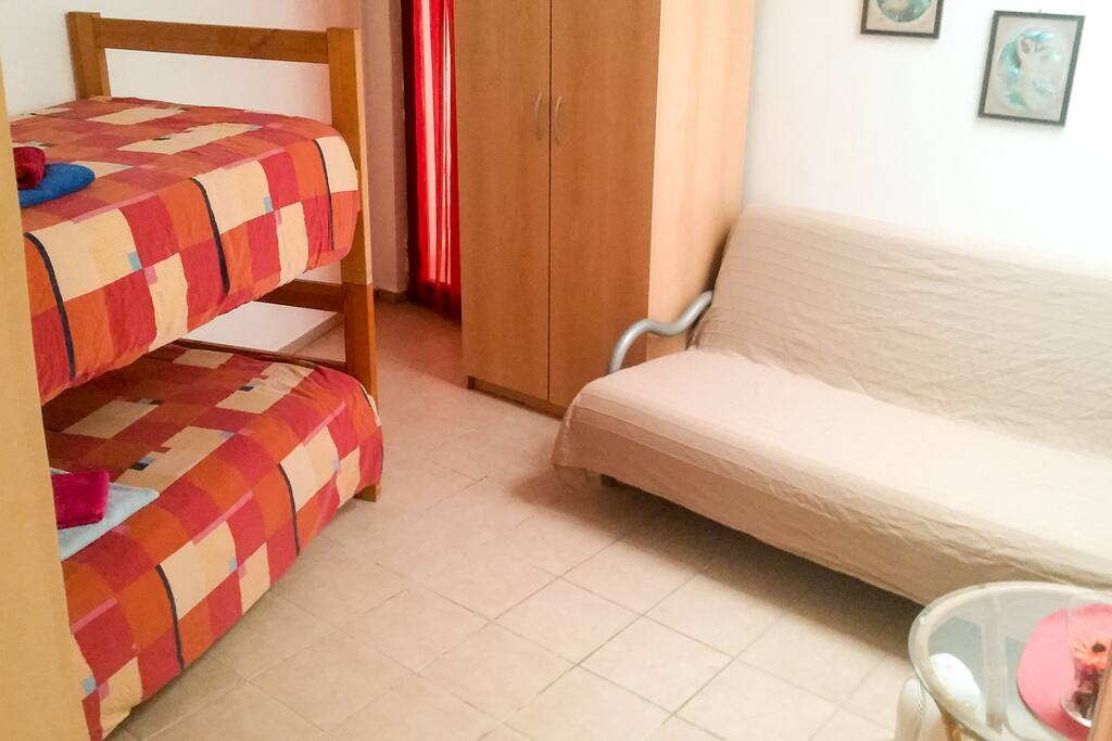 Room with entrance from terrace