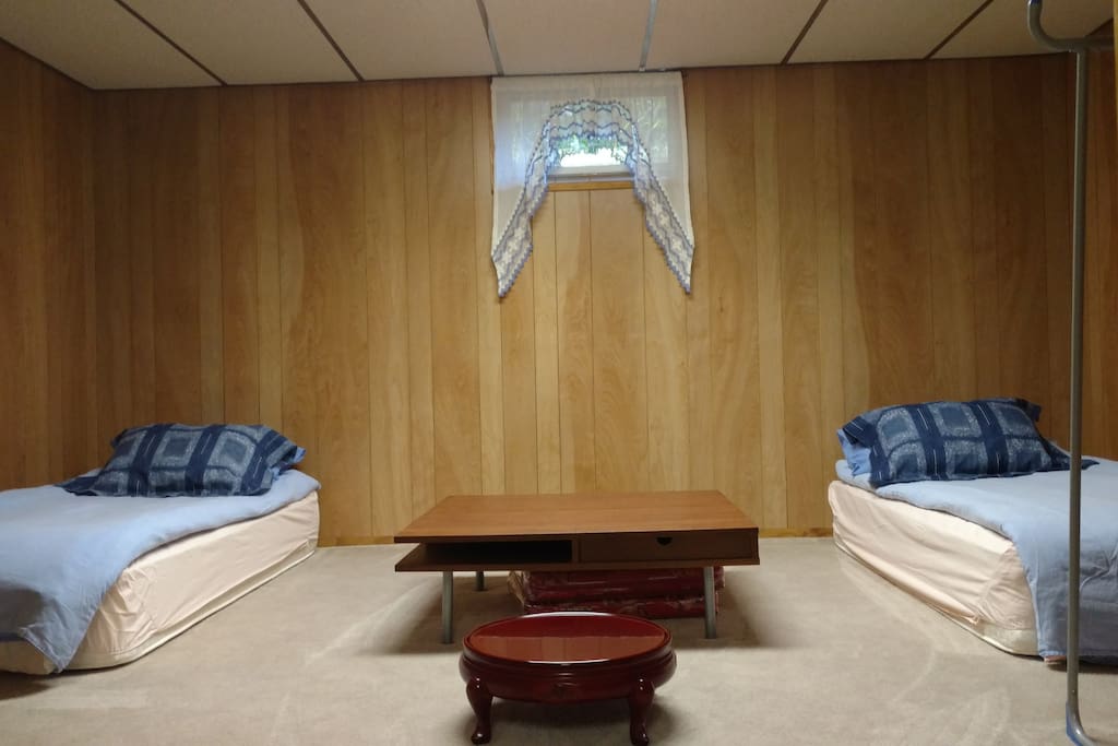 Japanese style open bedding with two firm bedding sets. Some guests like it even better when they are turned into a king size bed. In a floor all by itself with large sitting area and a fully equipped function room.