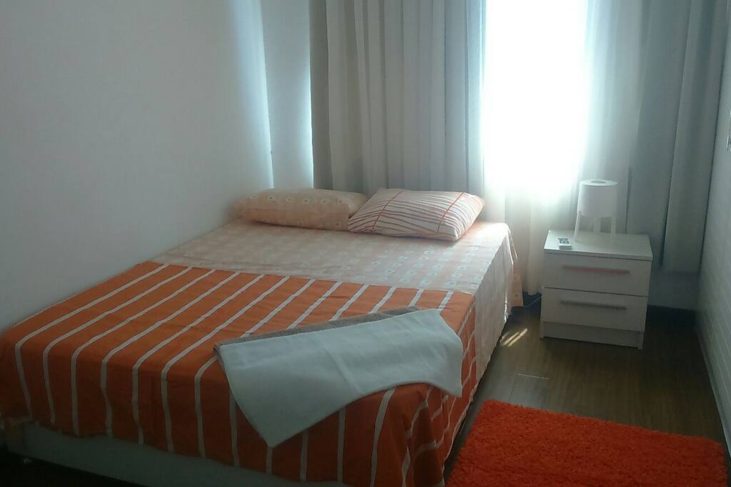First bedroom with one big bed. Первая спальная комната с одной большой кроватью.