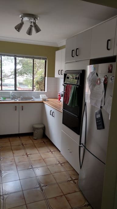 Kitchen w/ Fridge and Oven
