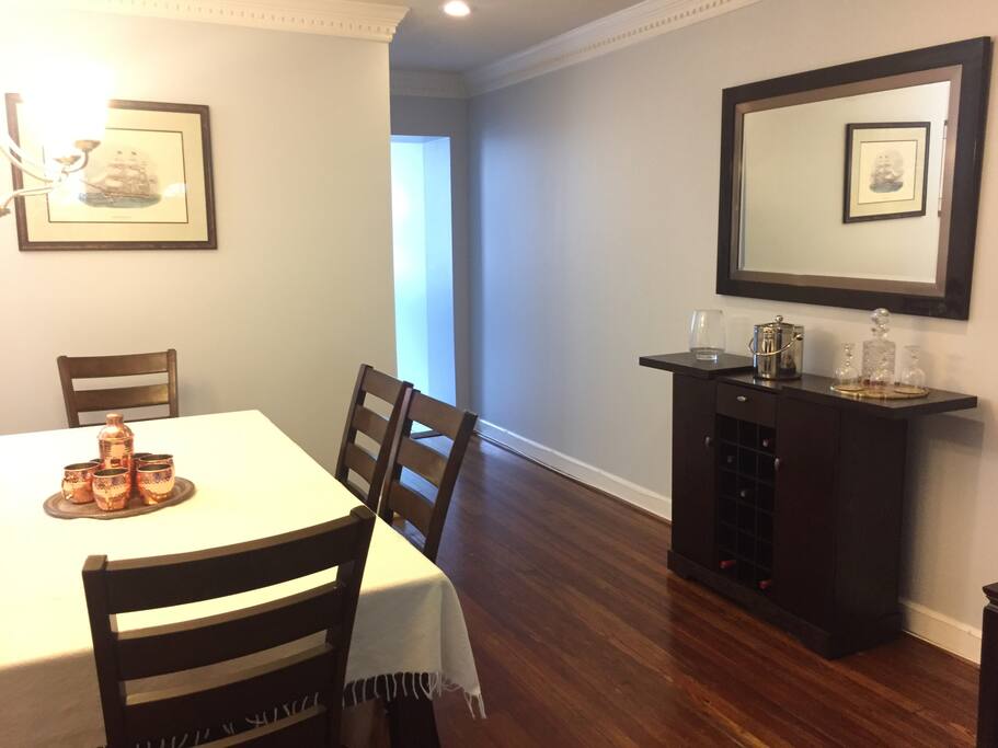 Dining room complete with six chairs and stemware