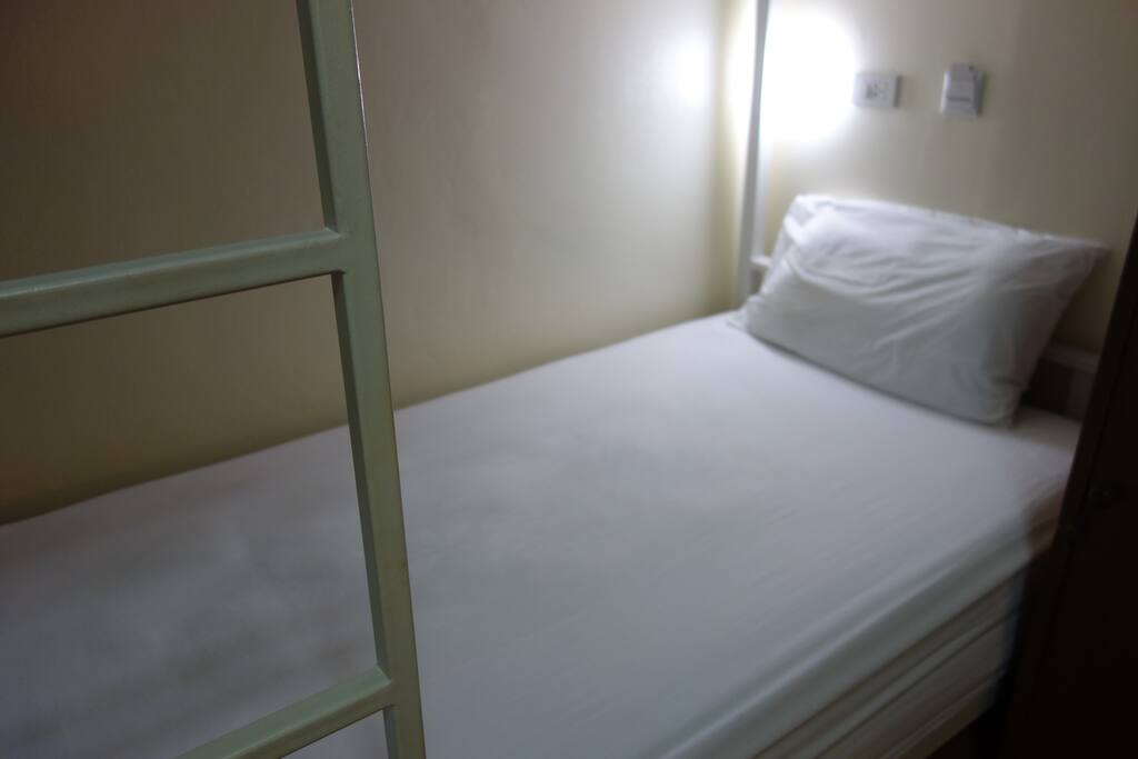 Comfy bunk bed in dormitory