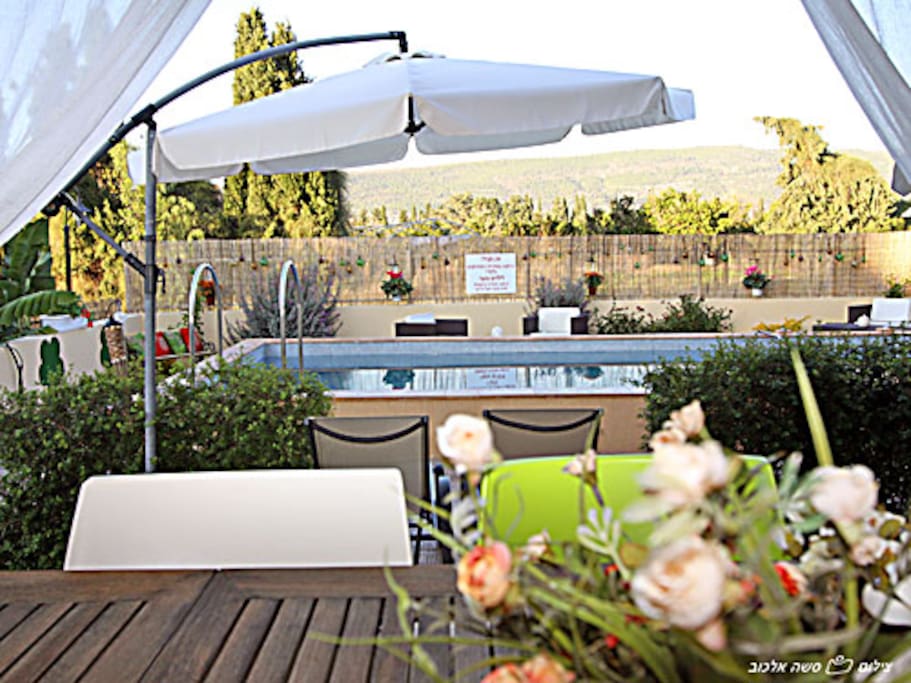 Outside view of the sweeming pool and the compound