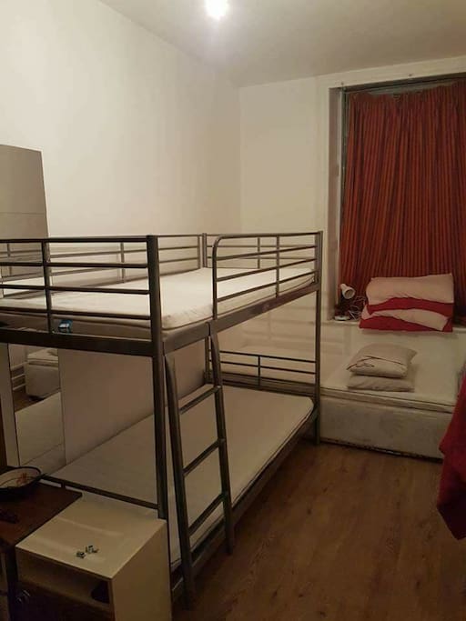 Room shared with two other girls. The berth is for the bottom bunk bed.