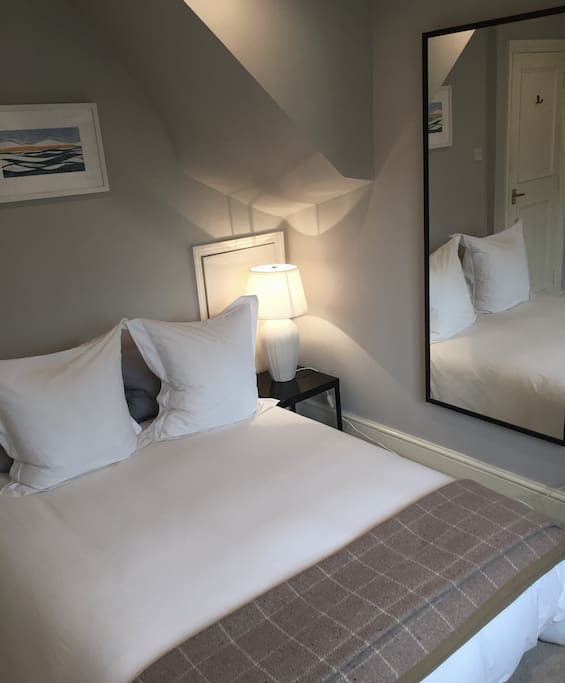Beautiful large double bed with high quality bedding.