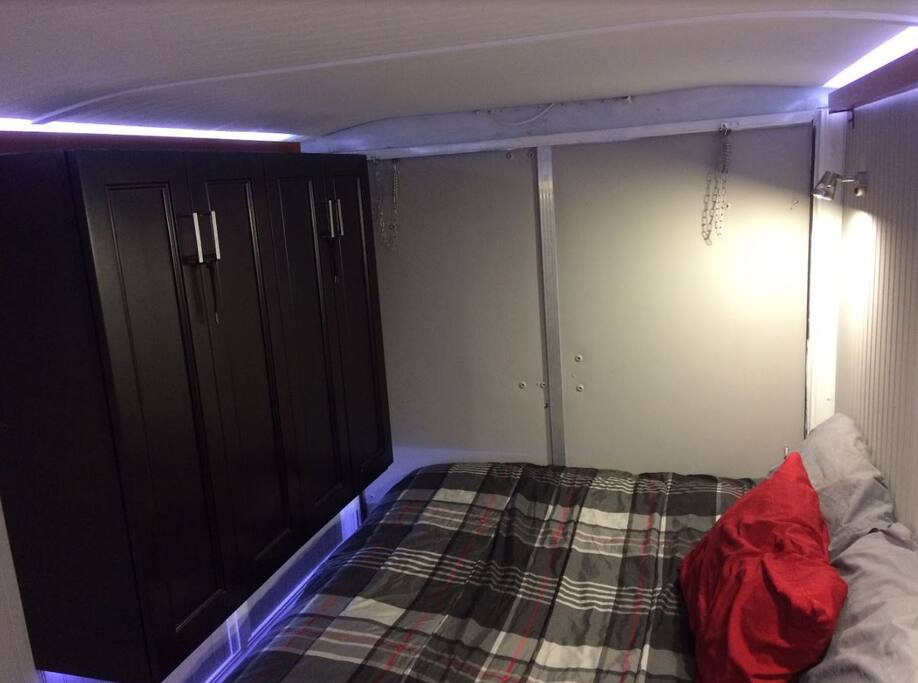 Just a different view of the clothing cabinets and bed