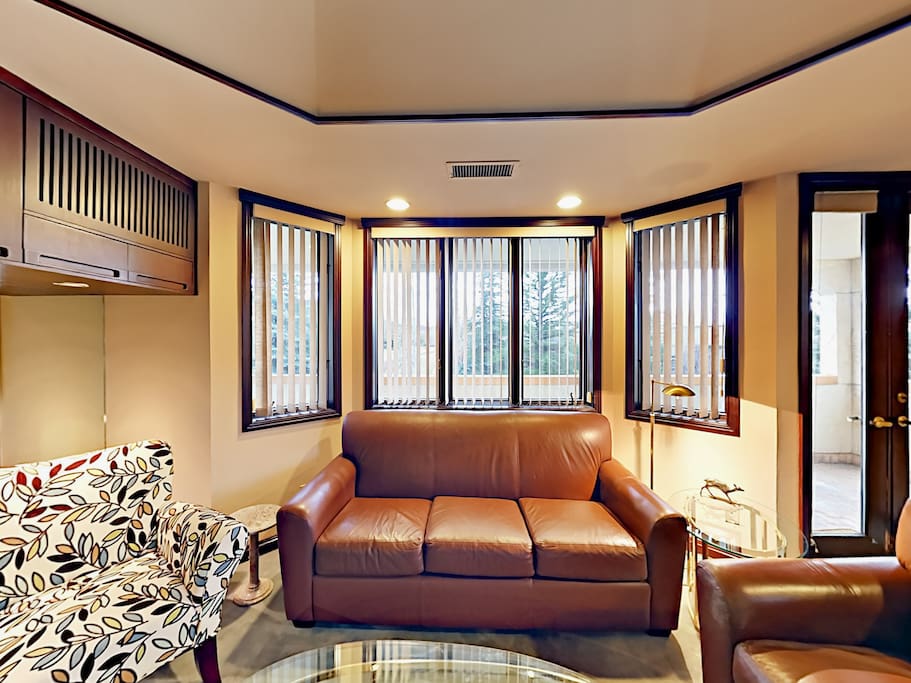 Access the large balcony from the living room.