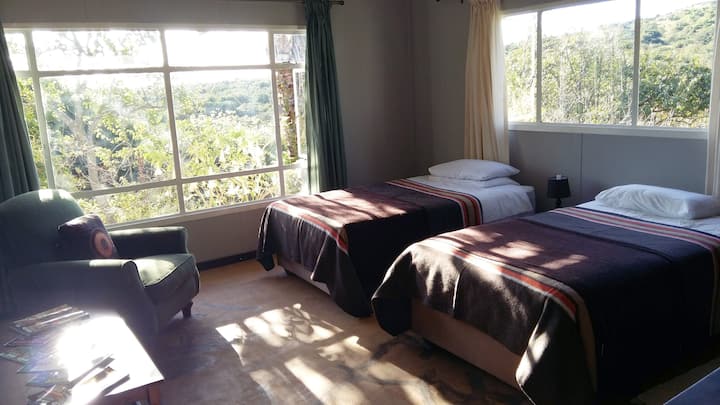 Bedroom 2 is spacious with wonderful views, morning sunshine and en suite shower and toilet.