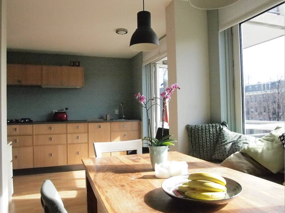 Canal side of the house. On the right side of the kitchen you step onto the balcony.
