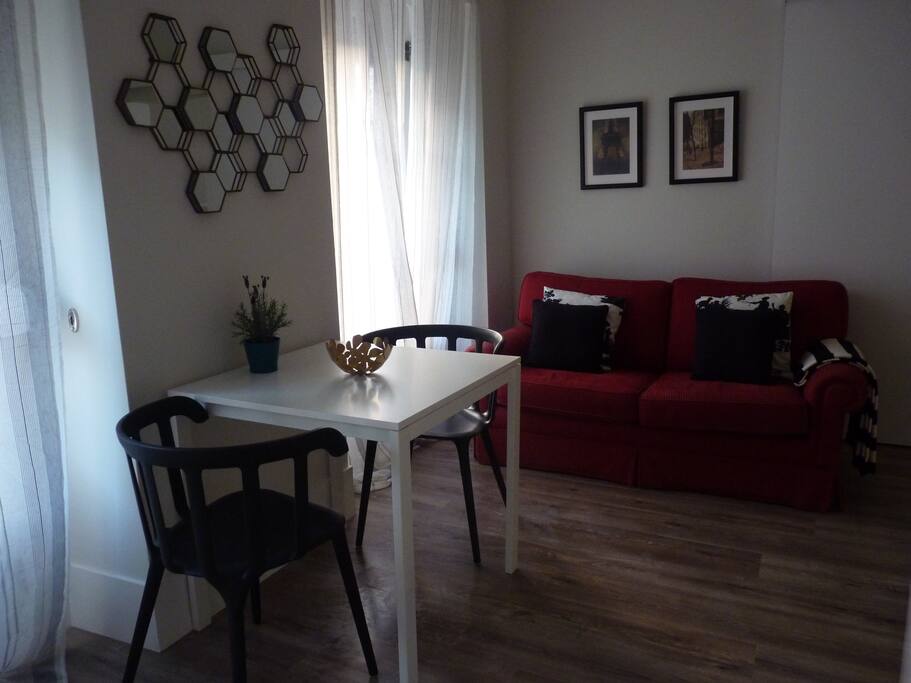 Sala com sofá-cama