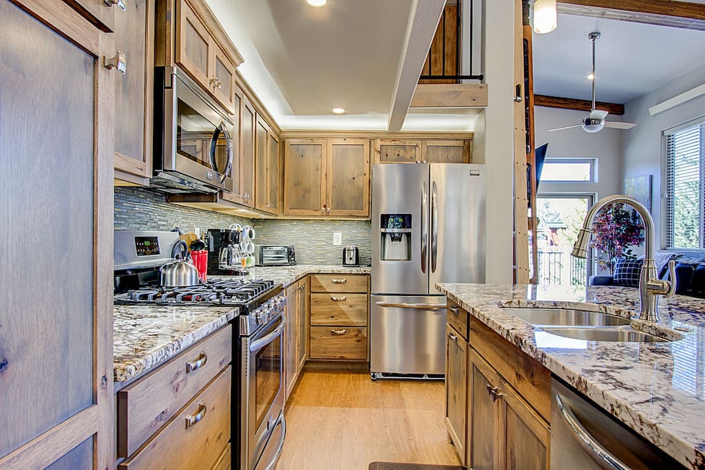 Fully Stocked Kitchen with dishwasher, gas range and full size refridgerator