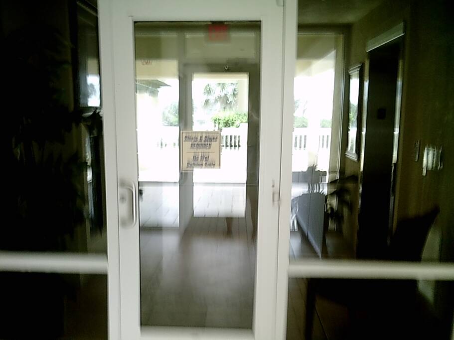 LOBBY EXIT DOOR TO BEACH, POOL, & HOT TUB
