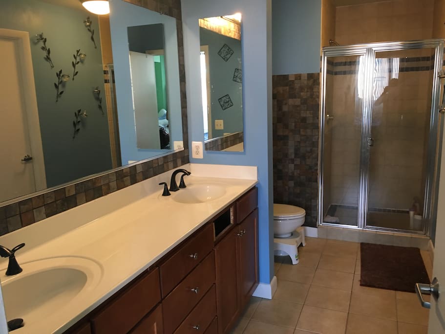 Full bath, stand-up shower, double sinks