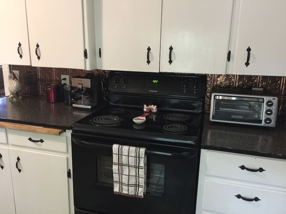Fully stocked kitchen with coffee and espresso maker. Bean safe and coffee grinder.