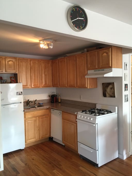 Spacious kitchen with dishwasher and gas stove