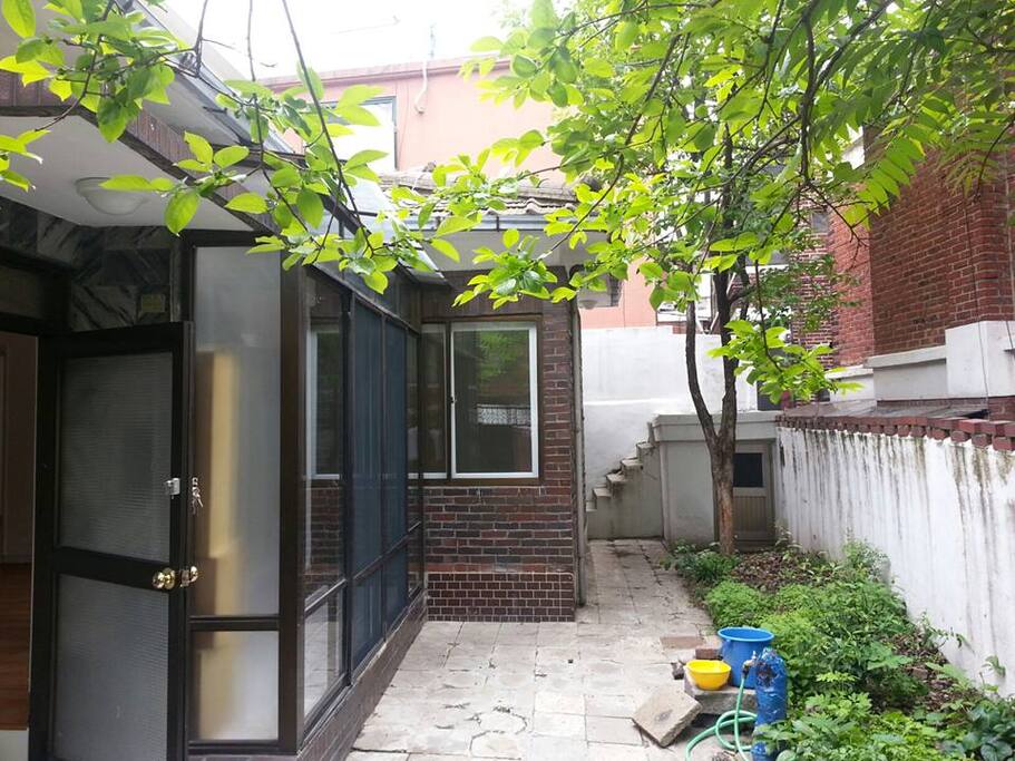 The garden is equipt with BBQ grill, table and chairs. It is a rare, private oasis in the heart of to this bustling city!
