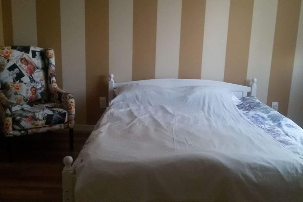 Master bedroom with a super king size bed