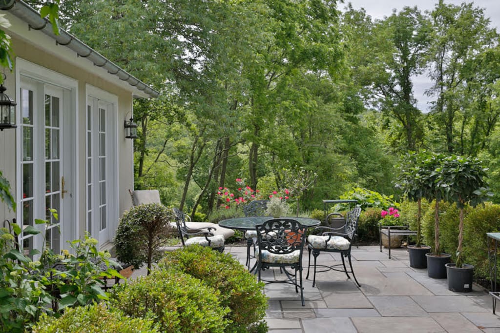 Patio with herb garden off of the living room.