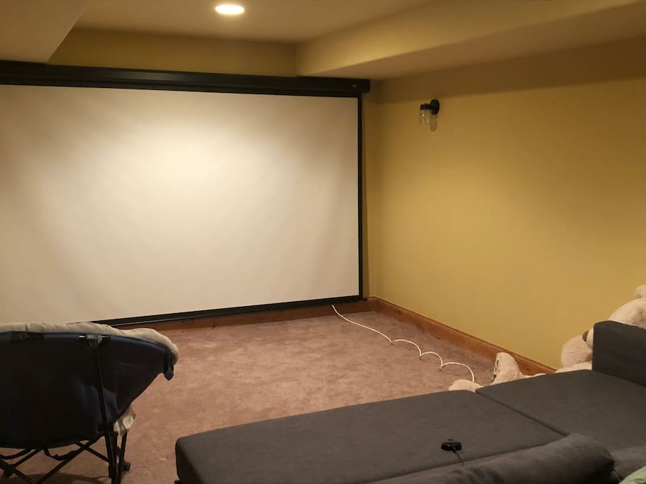 135" Media Room with 7.2 Surround sound and sofa bed