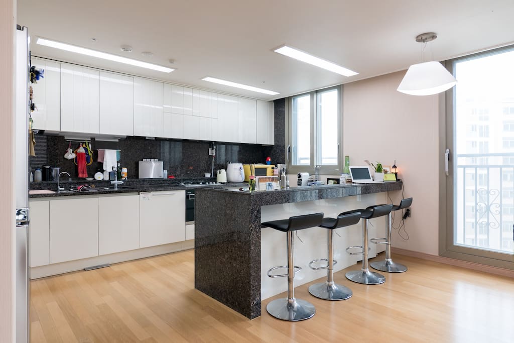 The kitchen area is huge for a big family or a large group of people. We used to invite our friends to enjoy cooking quality foods. All ingredients are easily purchased near the supermarket around the apartment complex.