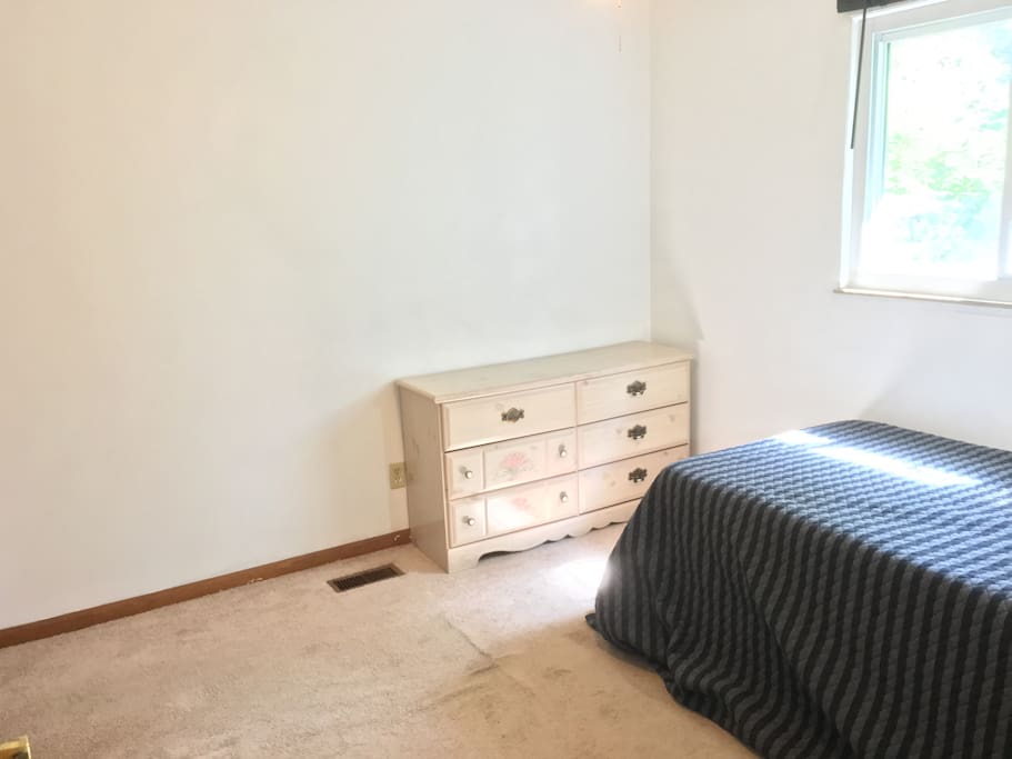 Bedroom - foot of bed + dresser