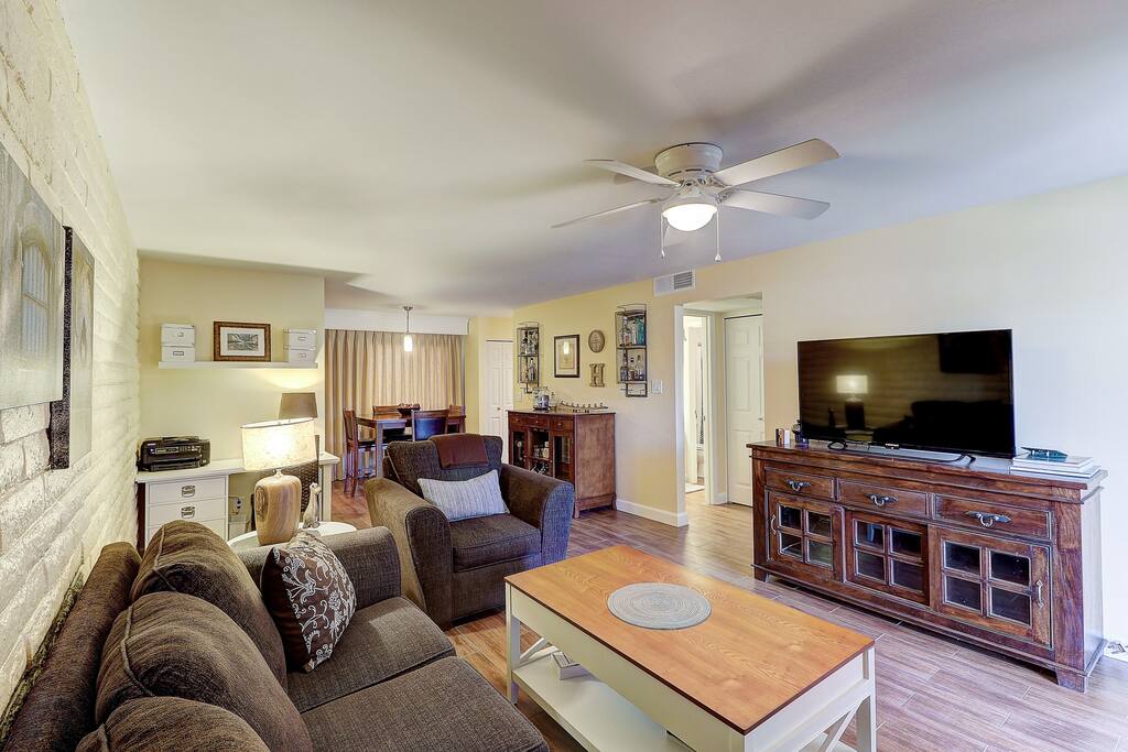 Living room with large flat screen TV. Antenna plus a Chromecast to stream your favorite entertainment and music.
